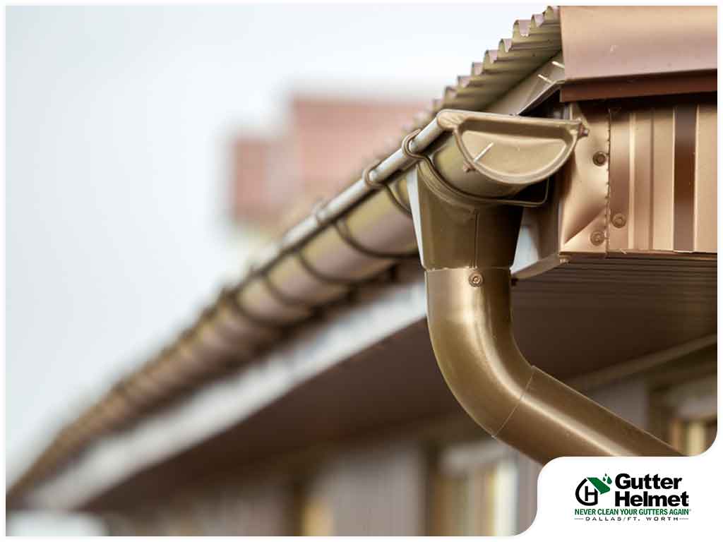 Half-Round vs. K-Style Gutters: Which Should You Choose?