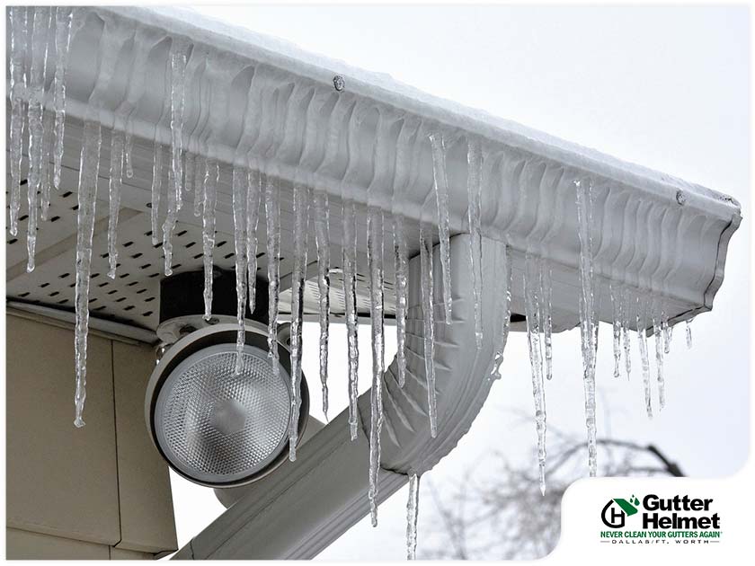 Ice Is Bad News for Your Roof and Gutters